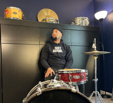 Load image into Gallery viewer, The 'JUST DRUM' premium pullover hoodie makes a perfect gift for drummers, percussionists, and music lovers who value quality.