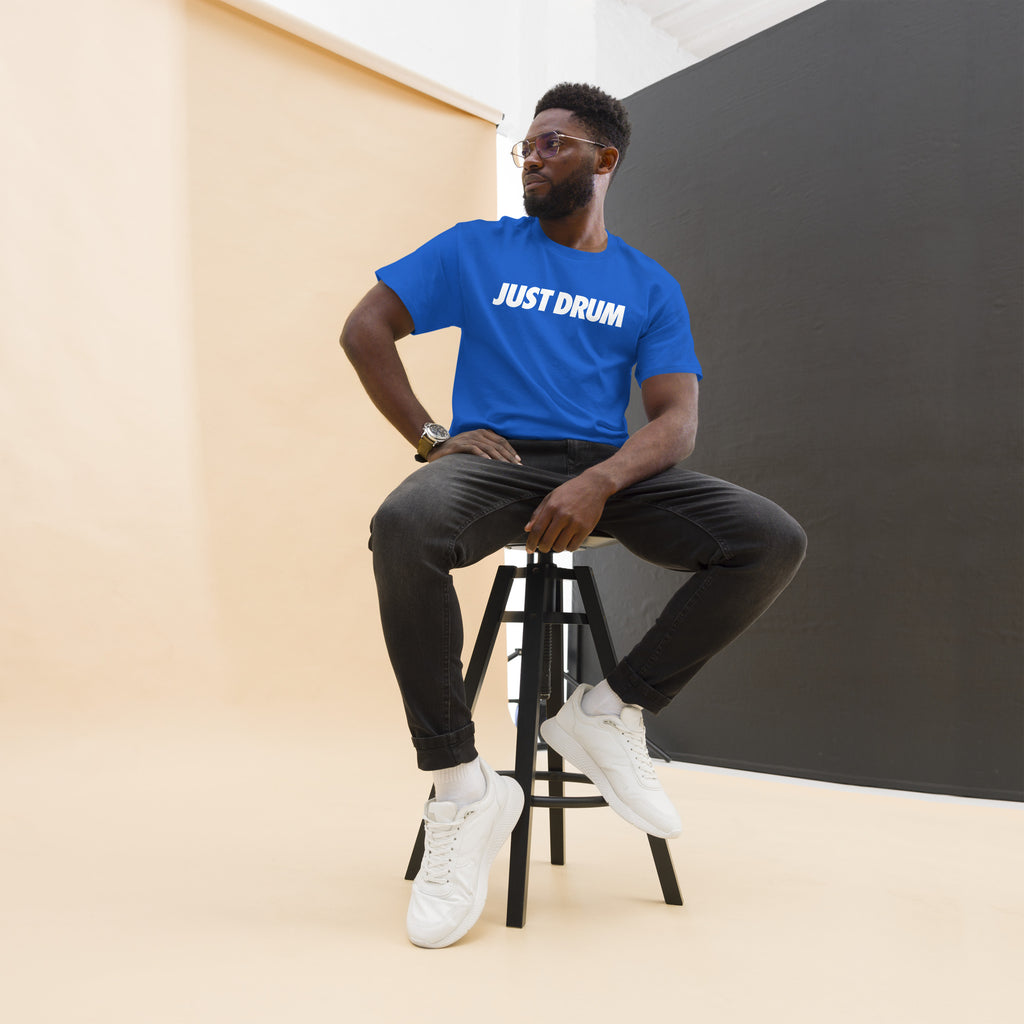 The perfect gift for drummers — the Just Drum Tee in blue from Drum Club Global. Premium unisex fit with bold JUST DRUM print. Rep the culture. Ships from Nashville, TN.