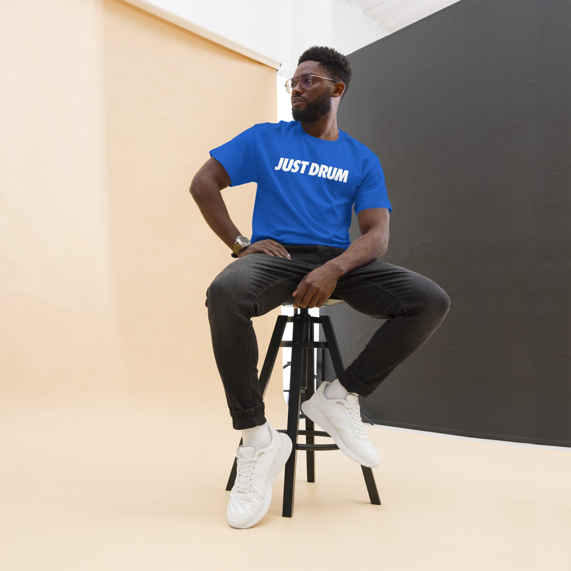 The perfect gift for drummers — the Just Drum Tee in blue from Drum Club Global. Premium unisex fit with bold JUST DRUM print. Rep the culture. Ships from Nashville, TN.