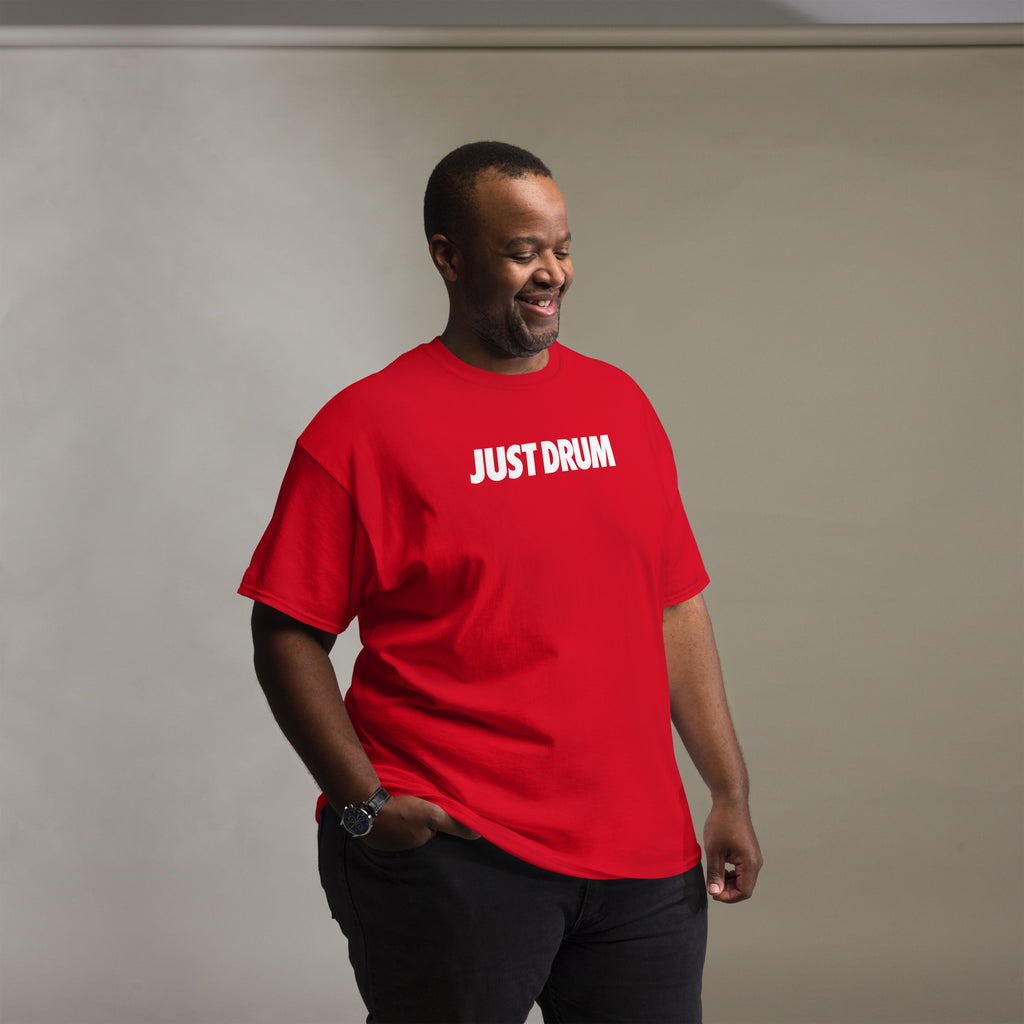 Drum Club Global's Just Drum Tee in red is built for drummers who show up and do the work. Premium unisex fit, bold chest print, ships from Nashville. Shop drumclubglobal.com