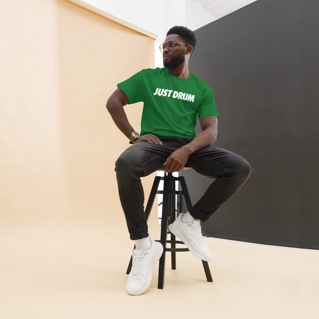 The perfect gift for drummers — the Just Drum Tee in green from Drum Club Global. Premium unisex fit with bold JUST DRUM print. Rep the culture. Ships from Nashville, TN.