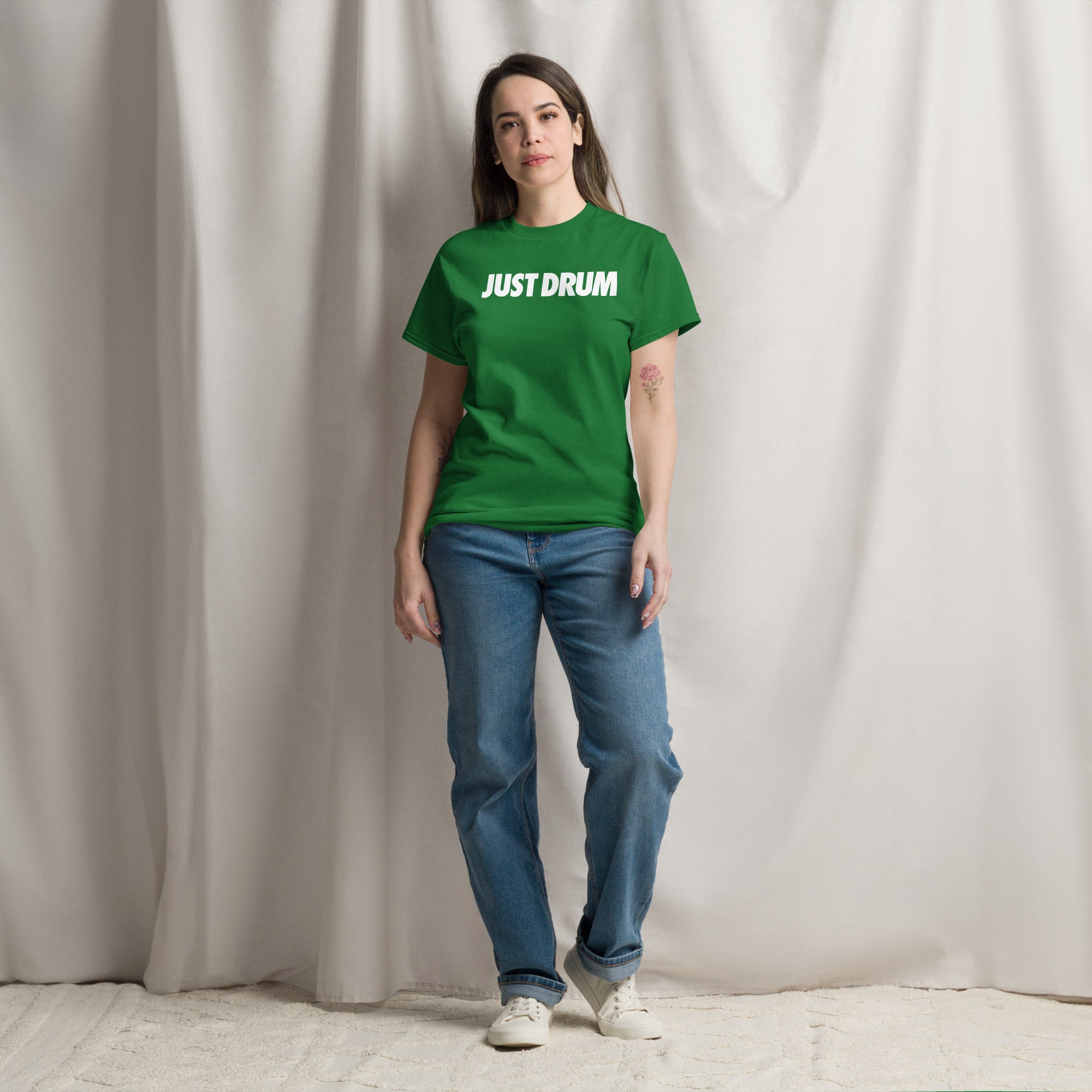 Rep the culture in green. The Drum Club Global Just Drum Tee features a bold JUST DRUM chest print on a premium green unisex tee. The perfect drummer gift. Ships from Nashville, TN