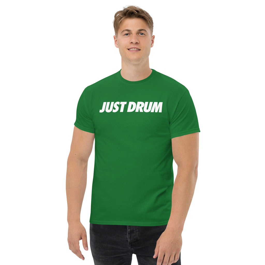 Drum Club Global Just Drum Tee in green — wear your passion every day. Unisex drummer t-shirt with bold chest print built for the serious musician. Shop drumclubglobal.com