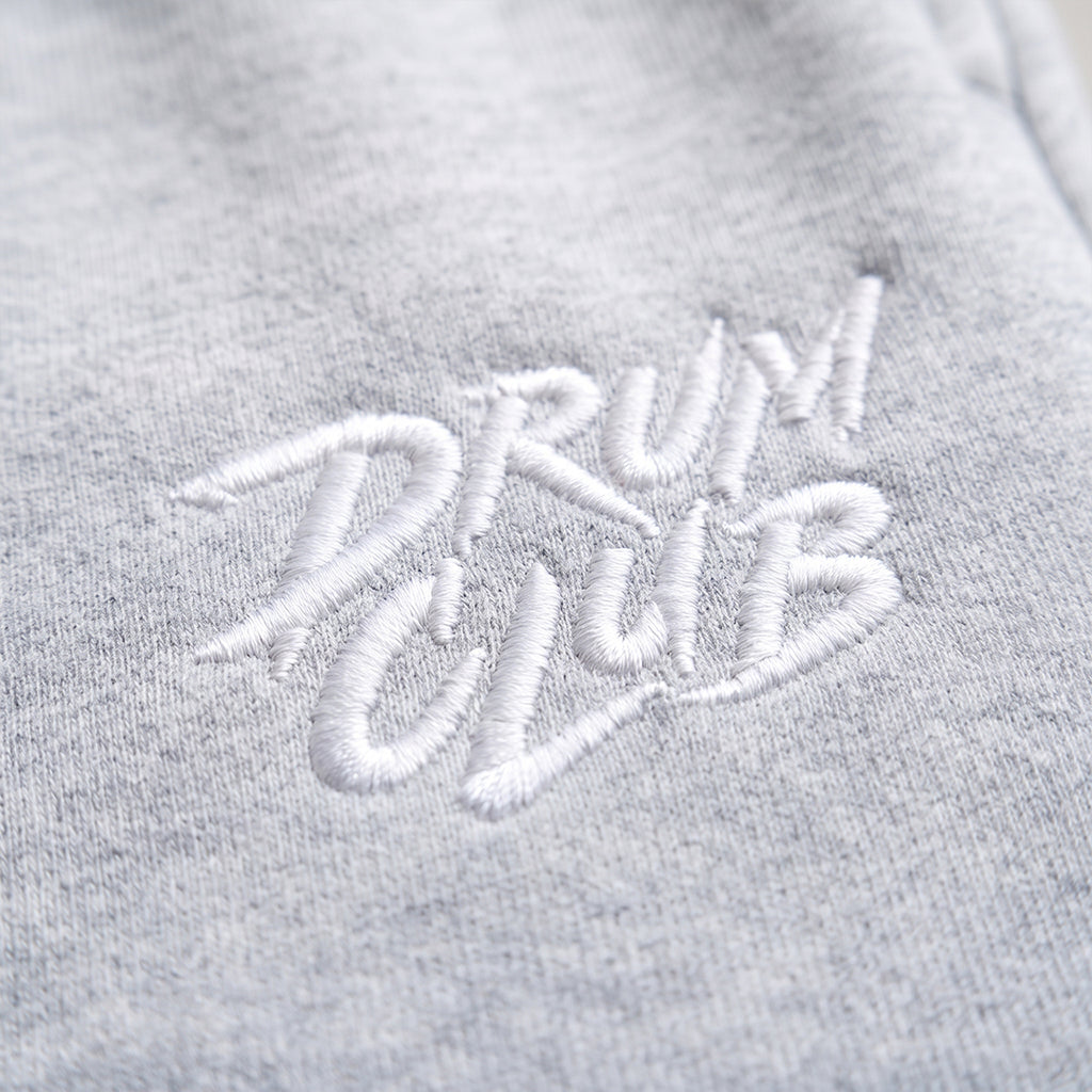 DRUM CLUB Brush Embroidered Fleece Joggers — Light Heather Gray