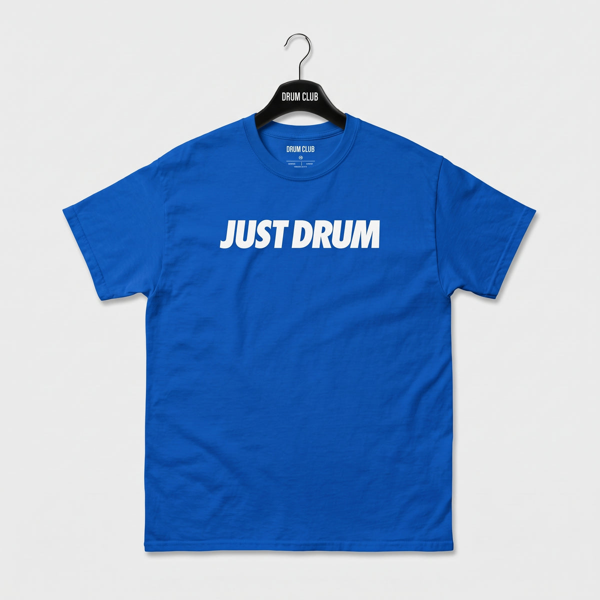 Blue Drum Club T-shirt with white Just Drum lettering across the chest, front view.